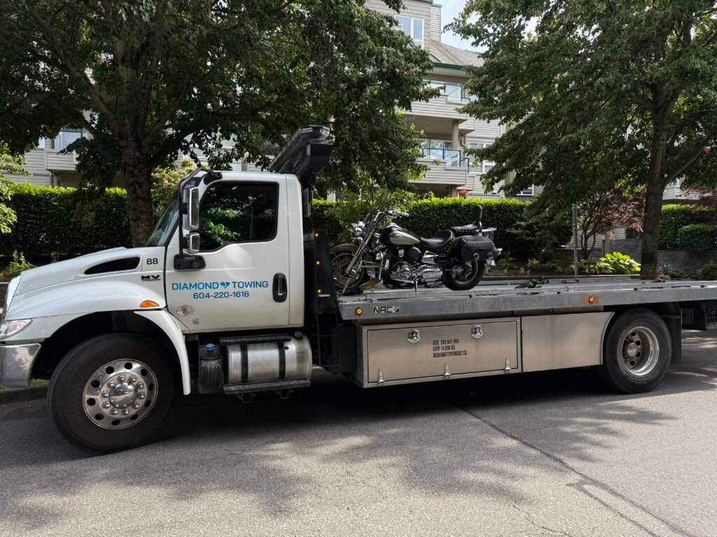tow truck towing motorbike
