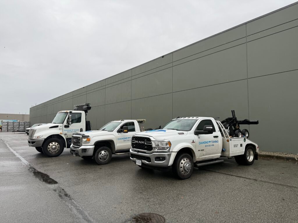 3 different types of tow trucks at diamond towing